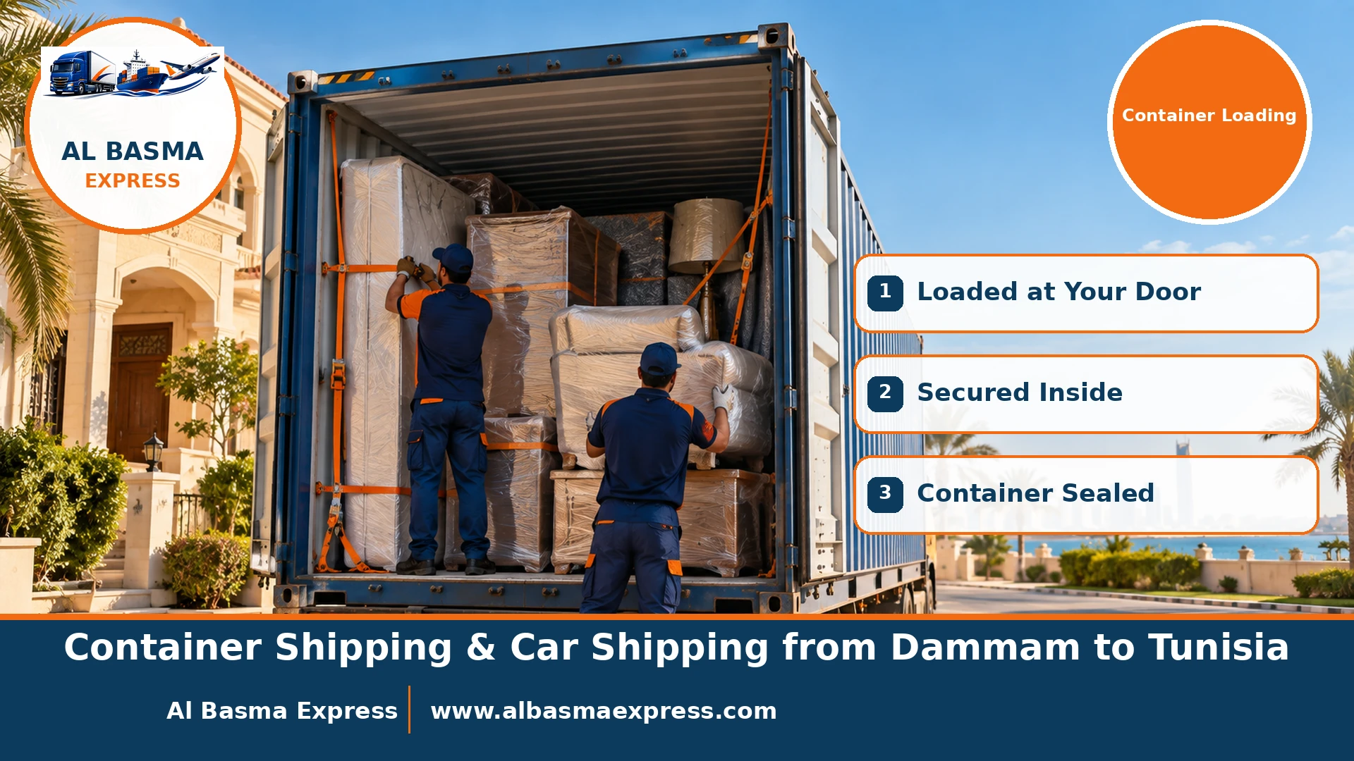 An open blue 40ft shipping container in front of a house in Dammam with two workers stacking wrapped furniture tightly inside with lashing straps