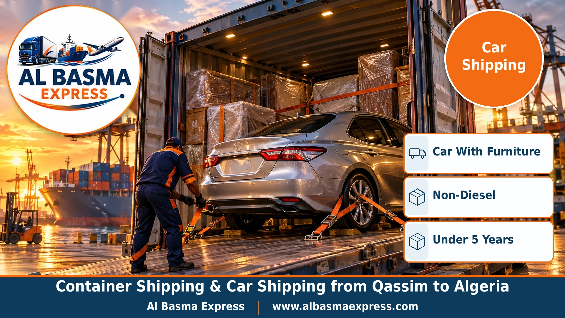 A modern silver petrol sedan being secured inside a container with wrapped furniture crates behind it and a worker tightening the straps